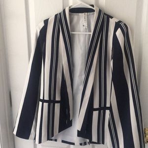 Super Trendy Cape blazer.